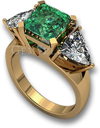 Anillo de compromiso de tres piedras con esmeraldas y diamantes