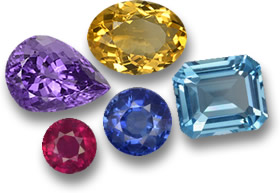 Certaines des pierres précieuses colorées les plus populaires : saphir bleu, rubis, topaze, citrine et améthyste.