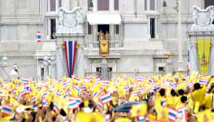 Thai People Dressed in Yellow to Show Respect for the King