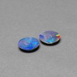 0.9 carat Multicolor Oval Cabochon Opal Doublet 7mm x 5