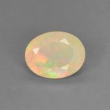 0.7 carat Multicolor Yellowish Green Oval Facet Opal 8mm x 6.5