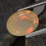 0.8 carat Multicolor Yellowish Green Oval Facet Opal 8mmx6mm