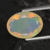 Click for Details 1.5 carat Multicolor Oval Facet Opal 10.5mm x 8