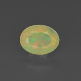 0.7 carat Multicolor Yellowish Green Oval Facet Opal 8mm x 6