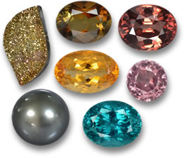 Edelsteine aus Regenbogenpyrit, Turmalin, Zirkon, Citrin, Perle und Apatit