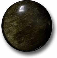 black gemstone with gold flecks