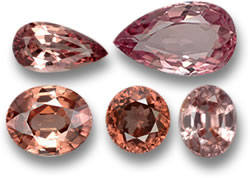 Espinela melocotón (arriba) y gemas de circón (abajo)