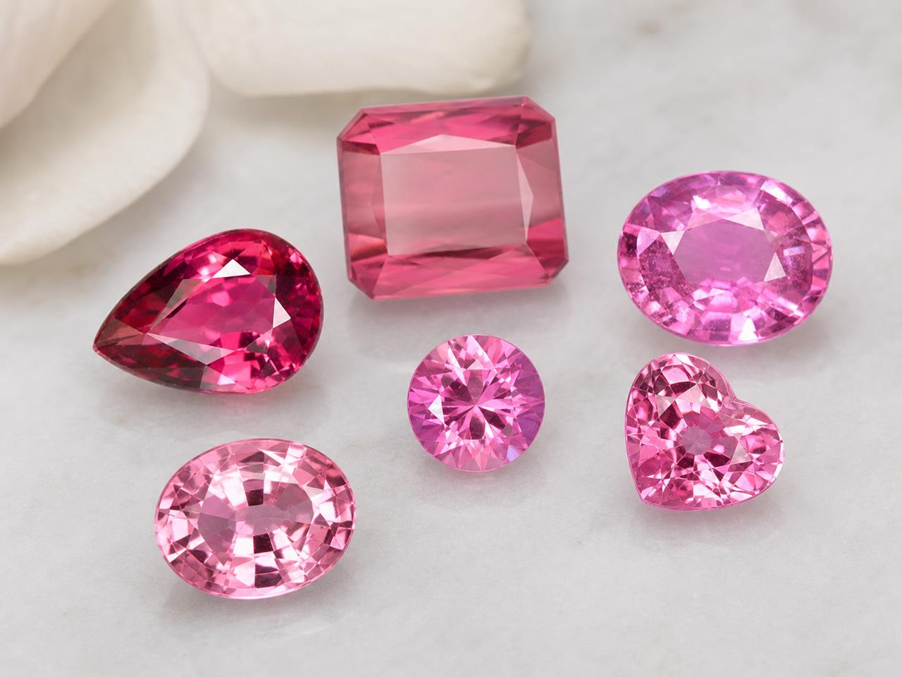 Loose durable pink gemstones in assorted jewelry shapes
