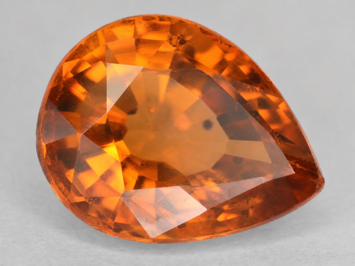 Close-up view of natural Orange Sapphire gemstones