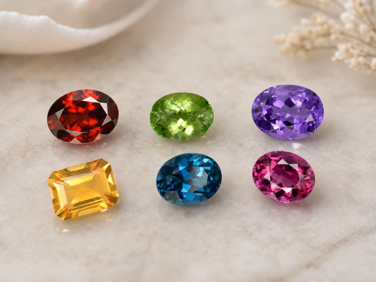 Assorted natural 6x4mm oval loose gemstones