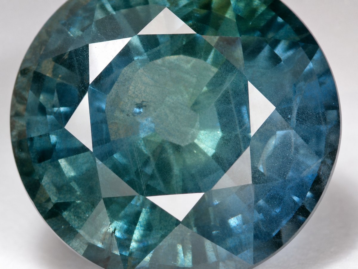 Close-up view of natural Teal Sapphire gemstones