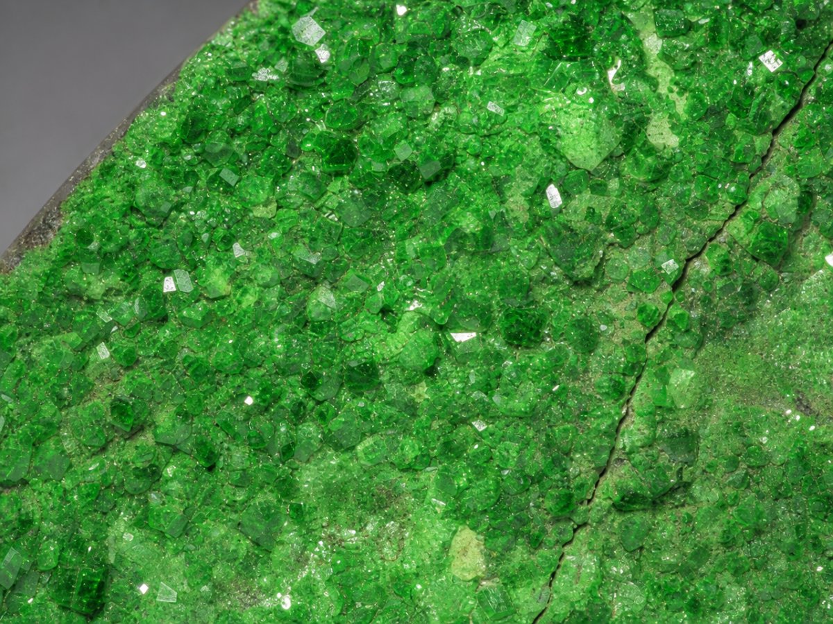 Close-up view of natural Uvarovite Garnet Drusy gemstones