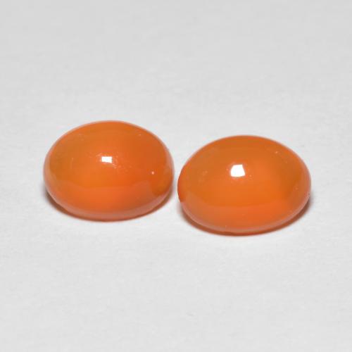 Matching Pair of 6.7 x 5.1mm Oval Cabochon Orange Agate, Weight of 1.41ct total / avg. 0.71ct each, Matching Agate Pair in Transparent Clarity in Warm Apricot Orange Color, Natural dyed gemstone, Mohs Hardness 6.5 - 7 suitable for daily wear jewelry, Photo A