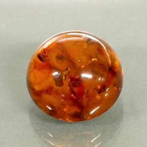 6.06 ct Orange Amber Gemstone, Amber Gem in Round Cabochon Shape for Sale.