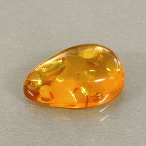2.41 ct Orange Amber Gemstone, Amber Gem in Pear Cabochon Shape for Sale.