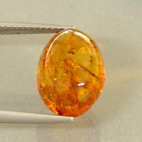 2.29 ct Orange Amber Gemstone, Amber Gem in Oval Cabochon Shape for Sale.