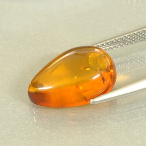 2.56 ct Orange Amber Gemstone, Amber Gem in Pear Cabochon Shape for Sale.