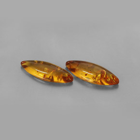 1.42 ct Orange Amber Gemstone, Amber Gem in Marquise Cabochon Shape for Sale.