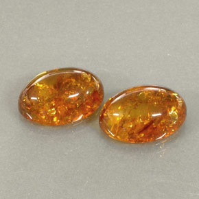4.45 ct Orange Amber Gemstone, Amber Gem in Oval Cabochon Shape for Sale.