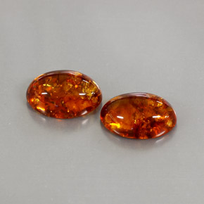 4.23 ct Orange Amber Gemstone, Amber Gem in Oval Cabochon Shape for Sale.