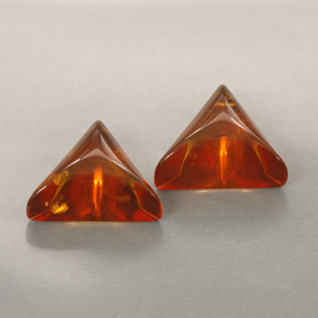 1.27 ct Orange Amber Gemstone, Amber Gem in Trillion Cabochon Shape for Sale.
