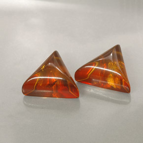 1.31 ct Orange Amber Gemstone, Amber Gem in Trillion Cabochon Shape for Sale.