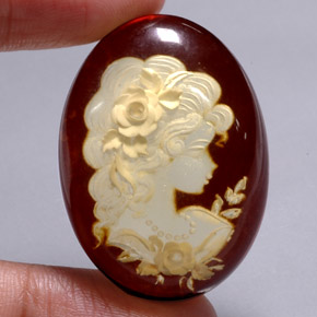25.28 ct Orange Amber Gemstone, Amber Gem in Carved Cameo Shape for Sale.