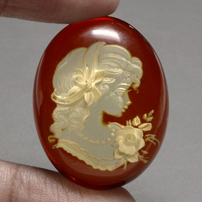 23.16 ct Orange Amber Gemstone, Amber Gem in Carved Cameo Shape for Sale.