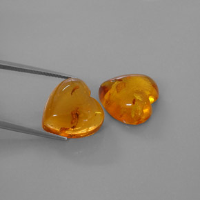 10.97 ct Orange Amber Gemstone, Amber Gem in Heart Cabochon Shape for Sale.