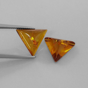 2.58 ct Orange Amber Gemstone, Amber Gem in Trillion Cabochon Shape for Sale.