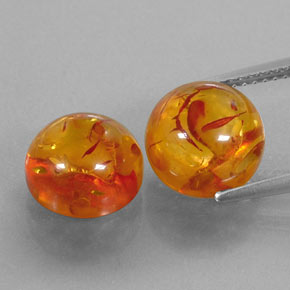 3.88 ct Orange Amber Gemstone, Amber Gem in Round Cabochon Shape for Sale.