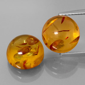 3.58 ct Orange Amber Gemstone, Amber Gem in Round Cabochon Shape for Sale.