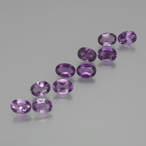 10 Stück 7,1 x 5mm ovaler Amethyst / Set - 6,19 ct Gesamtgewicht / Durchschn. je 0,62 ct, Farbe: Mittelviolett, Mohs-Härte 7 Geeignet für den täglichen Gebrauch im Schmuck, Jahr des Drachen-Edelsteins, Photo A