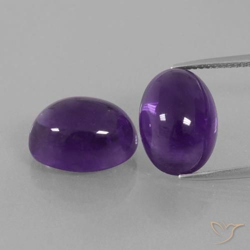 14.2 x 10.1mm Matching Oval Amethyst Pair - Weight 15.79ct total / avg. 7.9ct each, Natural untreated Gemstone, Medium-light Violet Color in Transparent Clarity, Mohs Hardness 7 suitable for daily wear jewelry, Pisces Zodiac Stone, Photo A