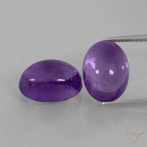 2pc Matching Oval Violet Amethysts in Size 14.1 x 10mm, Weight 14.2ct total / avg. 7.1ct each, Medium-light Violet in Transparent Clarity, Natural untreated Gemstone, Mohs Hardness 7 suitable for daily wear jewelry, February Birthstone, Photo A
