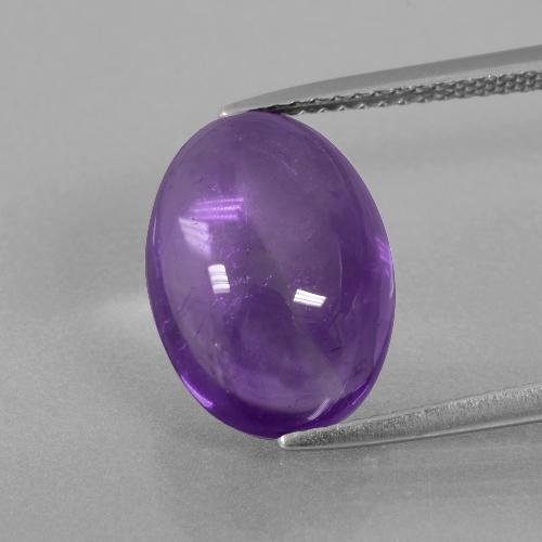 14 x 10.1mm Oval Cabochon Violet Amethyst from Brazil, Weight of 6.14ct, Natural untreated gemstone in Transparent Clarity, 1pc Amethyst - the Color is Medium Violet, Mohs Hardness of 7 suitable for daily wear jewelry, Stone of the Mind, Photo A