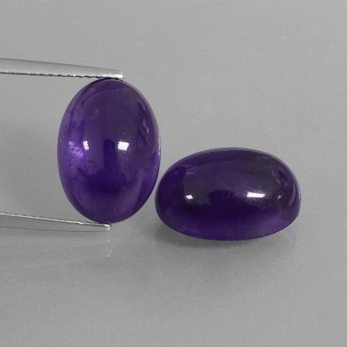 2pc Matching Oval Violet Amethysts in Size 14.1 x 10mm, Weight 14.72ct total / avg. 7.36ct each, Dark Violet in Transparent Clarity, Natural untreated Gemstone, Mohs Hardness 7 suitable for daily wear jewelry, Year of the Dragon Gemstone, Photo A