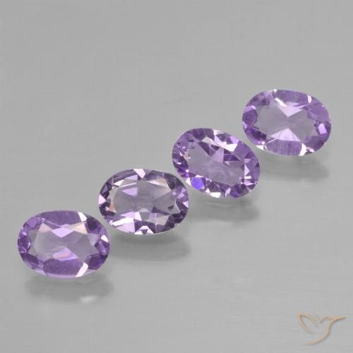 Lotto di 4 pezzi taglio ovale viola Ametista dal Brasile - Peso totale 2,41 ct / avg. 0,6 ct ciascuno, dimensioni 7,1 x 5,1mm, colore: Melanzane Viola, durezza Mohs 7 adatto per gioielli da indossare ogni giorno, Mercoledì Gemma, Photo A