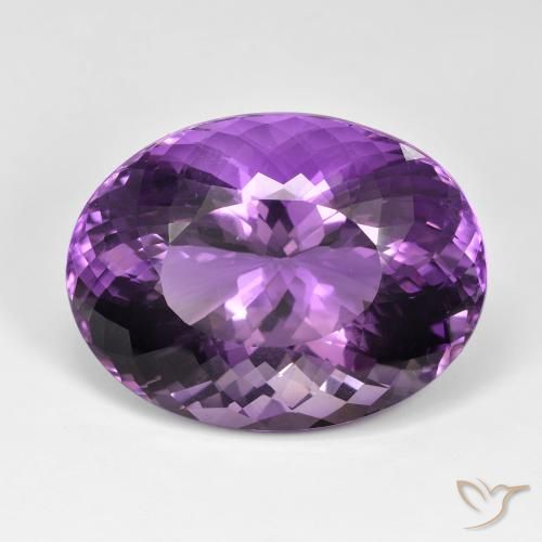 89.75ct Oval Portuguese-cut Violet Amethyst from Brazil, Dimension 34.6 x 26.2mm, IF Clarity, Natural untreated gemstone, 1pc Amethyst in Purplish Violet Color, Mohs Hardness of 7 suitable for daily wear jewelry, Year of the Dragon Gemstone, Photo A