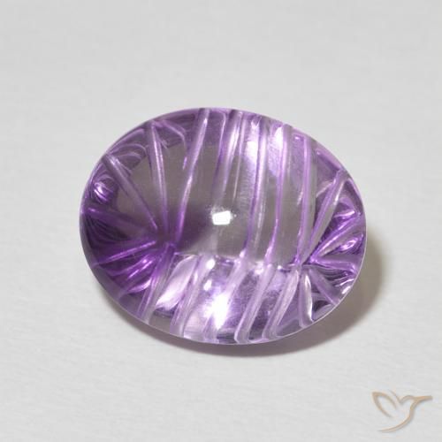 6.74 ct Violet Amethyst Stone, Natural Amethyst in Carved Oval Shape for Sale