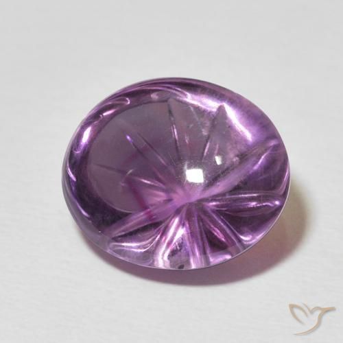 7.79 ct Violet Amethyst Stone, Natural Amethyst in Carved Oval Shape for Sale