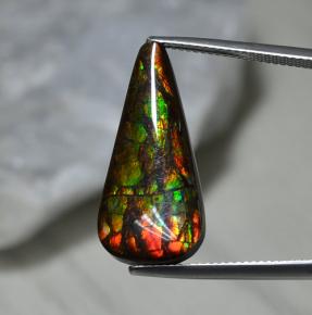 10.29 ct Multicolor Ammolite Gemstone, Ammolite Gem in Pear Cabochon Shape for Sale.