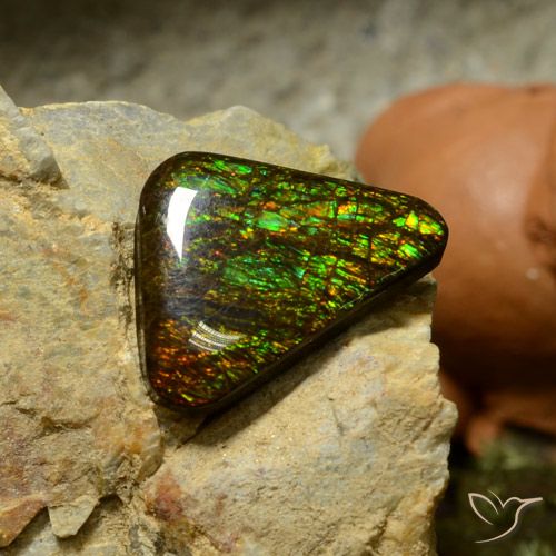 10.34 ct Multicolor Ammolite Gemstone, Ammolite Gem in Trillion Cabochon Shape for Sale.