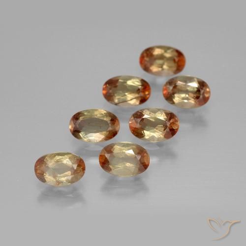 Lot of 7pc Oval Facet Multicolor Andalusite from Brazil - Size 6 x 4mm, Weight 3.46ct total / avg. 0.49ct each, Color: Multicolor, Mohs Hardness 7.5 suitable for daily wear jewelry, Photo A