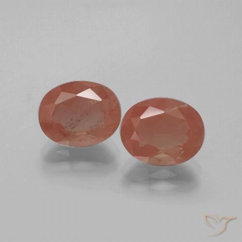 Matching Pair of 10.2 x 8.2mm Oval Facet Red Andesine Labradorite, Weight of 5.49ct total / avg. 2.75ct each, Matching Andesine Labradorite Pair in Transparent Clarity in Medium Red Color, Natural diffused gemstone, Mohs Hardness 6 - 6.5, Photo A