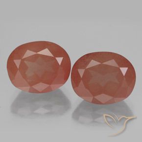 Matching Pair of 11.2 x 9.1mm Oval Facet Red Andesine Labradorite, Weight of 7.83ct total / avg. 3.92ct each, Matching Andesine Labradorite Pair in Transparent Clarity in Pale Reddish Orange Color, Natural diffused gemstone, Mohs Hardness 6 - 6.5, Photo A
