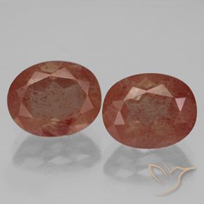 Matching Pair of 10.2 x 8.1mm Oval Facet Red Andesine Labradorite, Weight of 5.32ct total / avg. 2.66ct each, Matching Andesine Labradorite Pair in Translucent Clarity in Medium Red Color, Natural diffused gemstone, Mohs Hardness 6 - 6.5, Photo A