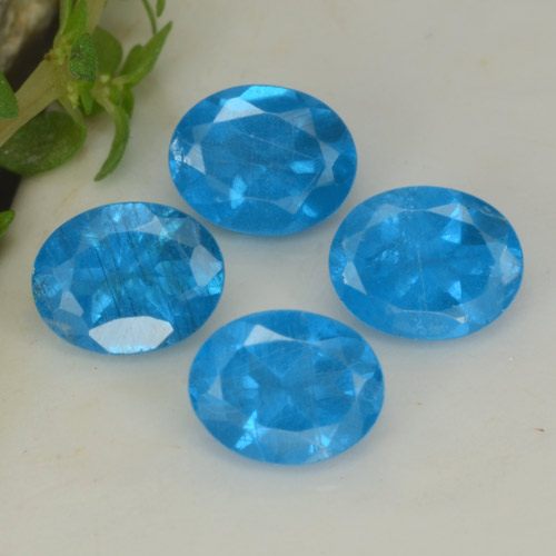 4pc Oval Intense Blue Apatite Lot from Madagascar - Weight 1.6ct total / avg. 0.4ct each, Size 5.2 x 4mm, Color: Intense Blue, Mohs Hardness 5 - 5, Photo A