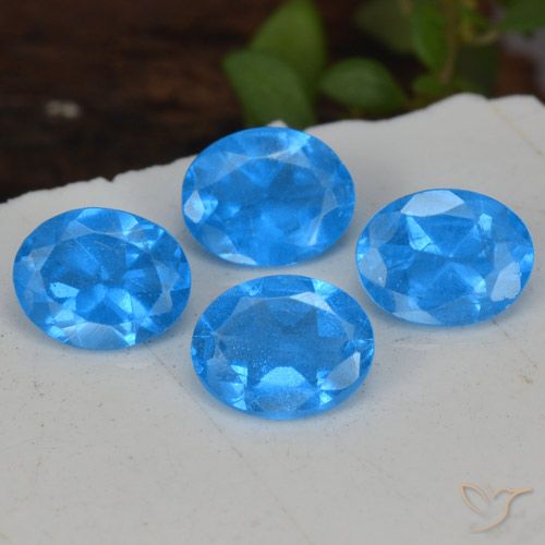 Lot de 4pcs Apatites Bleu oval facet de Madagascar - Taille 5 x 4mm, poids total 1,29 ct / moyenne 0,32 ct chaque, couleur : Bleu intense , dureté de Mohs 5 à 5, Photo A