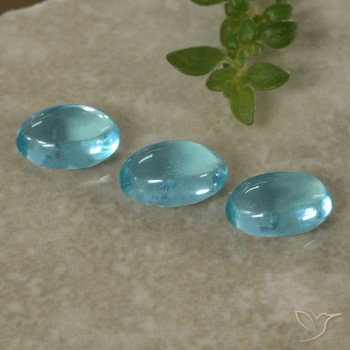 3pc Oval Cabochon Blue Apatite Lot from Madagascar - Weight 1.32ct total / avg. 0.44ct each, Size 5.9 x 3.9mm, Color: Medium Blue, Mohs Hardness 5 - 5, Photo A